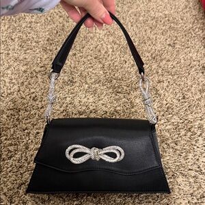 Elegant Black Handbag with Silver Accents